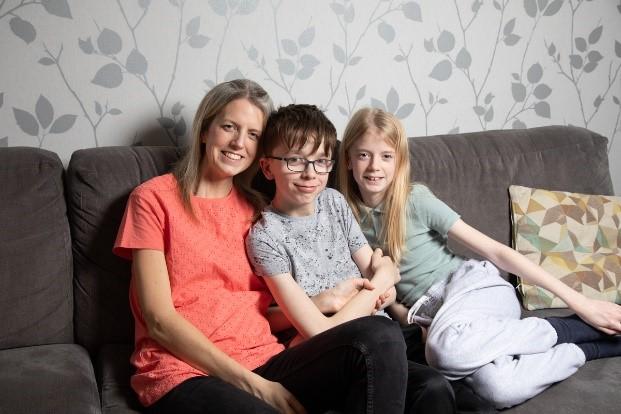 Image of Max with his family