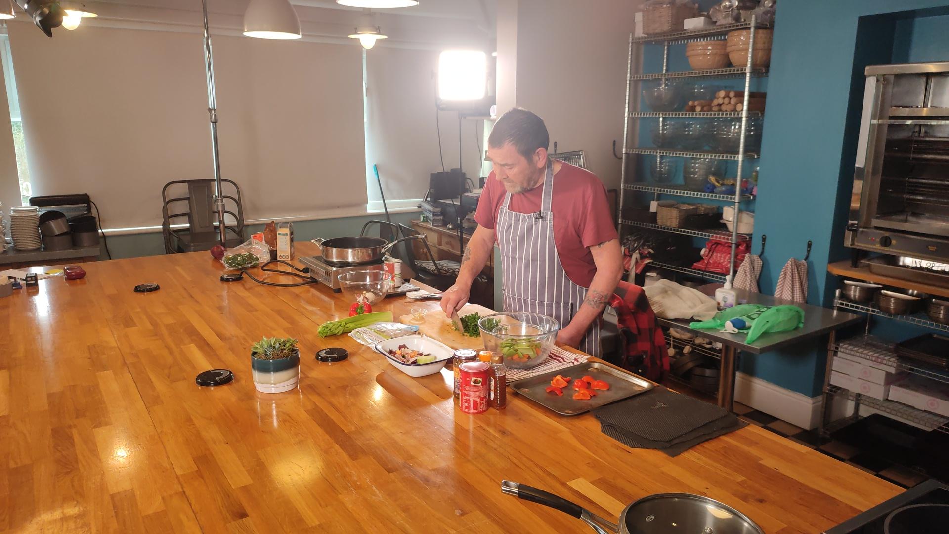 Image of Chris cooking in the kitchen