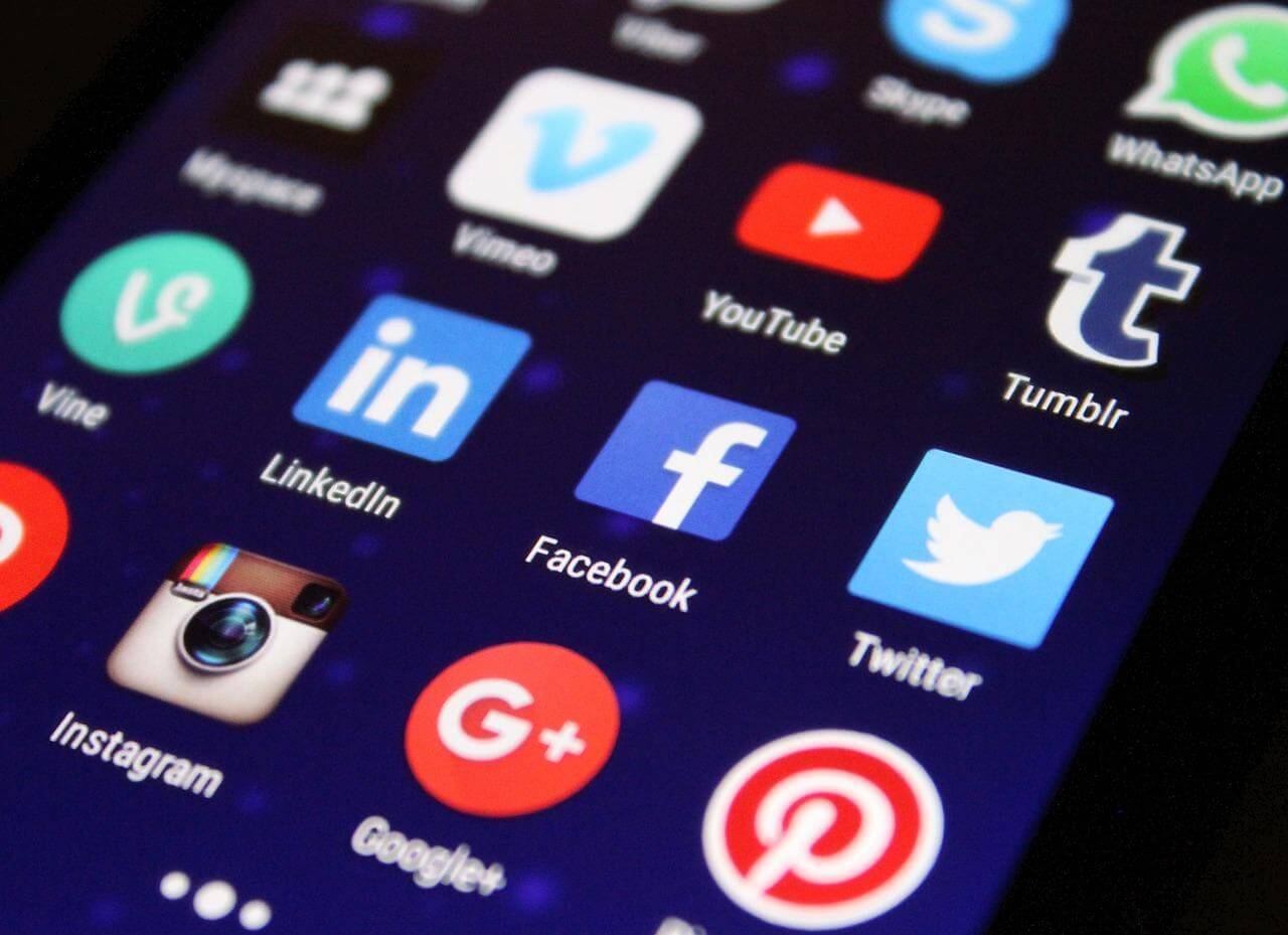 Mobile phone screen showing social media icons