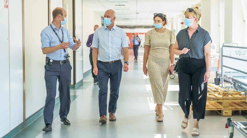 Photo of MSPs in Ninewells Hospital with health professionals.