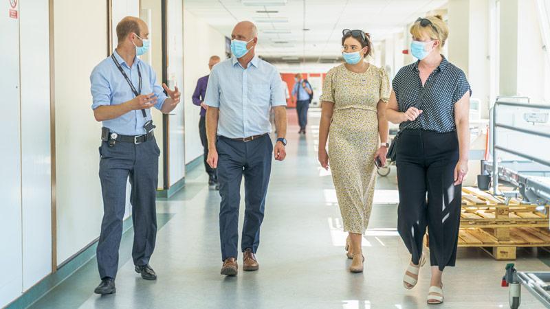 Photo of MSPs in Ninewells Hospital with health professionals.