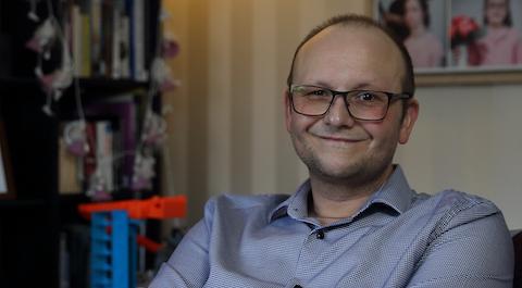 Phil looking at the camera and smiling