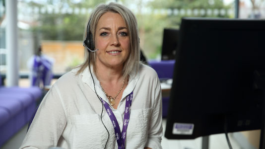 Sarah Day from the Stroke Association's Helpline at her desk