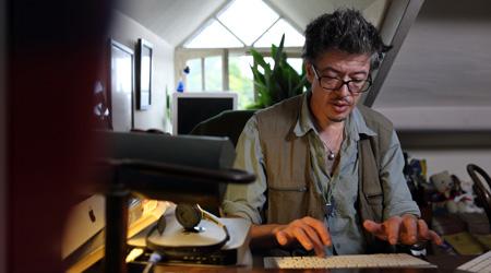 Photo of Rupert at his computer