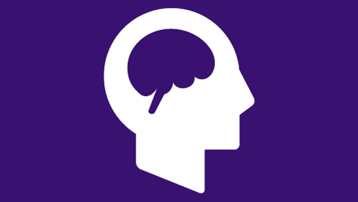 Brain in head icon in purple 