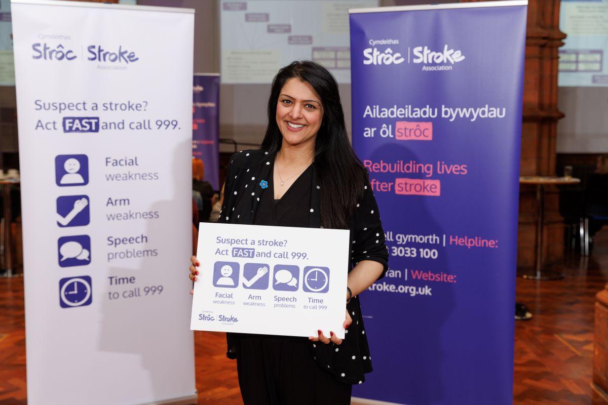 Natasha Asghar holding FAST poster 