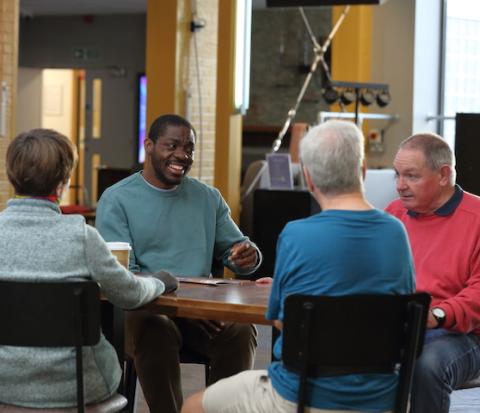Stroke survivor Alex with his support group