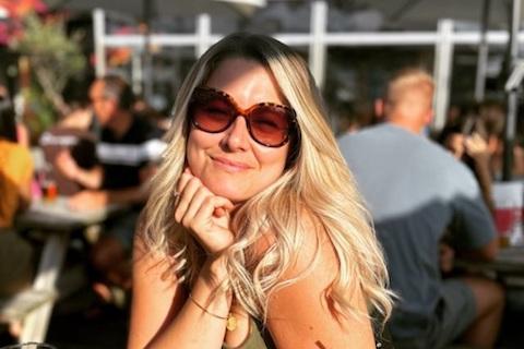 Alex, a stroke survivor, smiling at the camera
