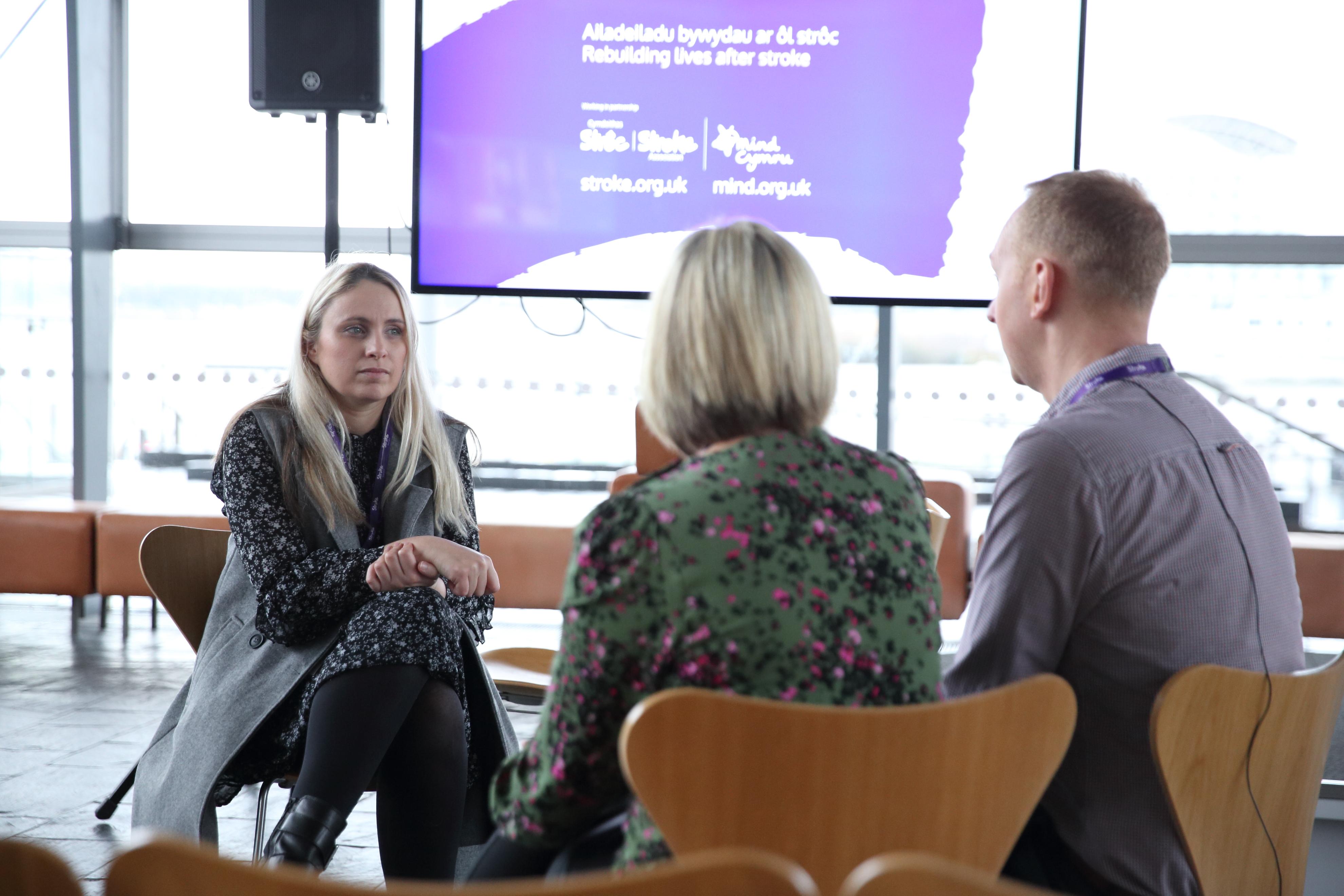 Three people speaking together at the Rebuilding Minds After Stroke conference 