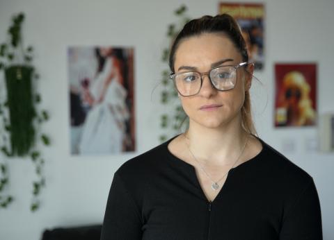 Kate, a stroke survivor, looking directly at the camera