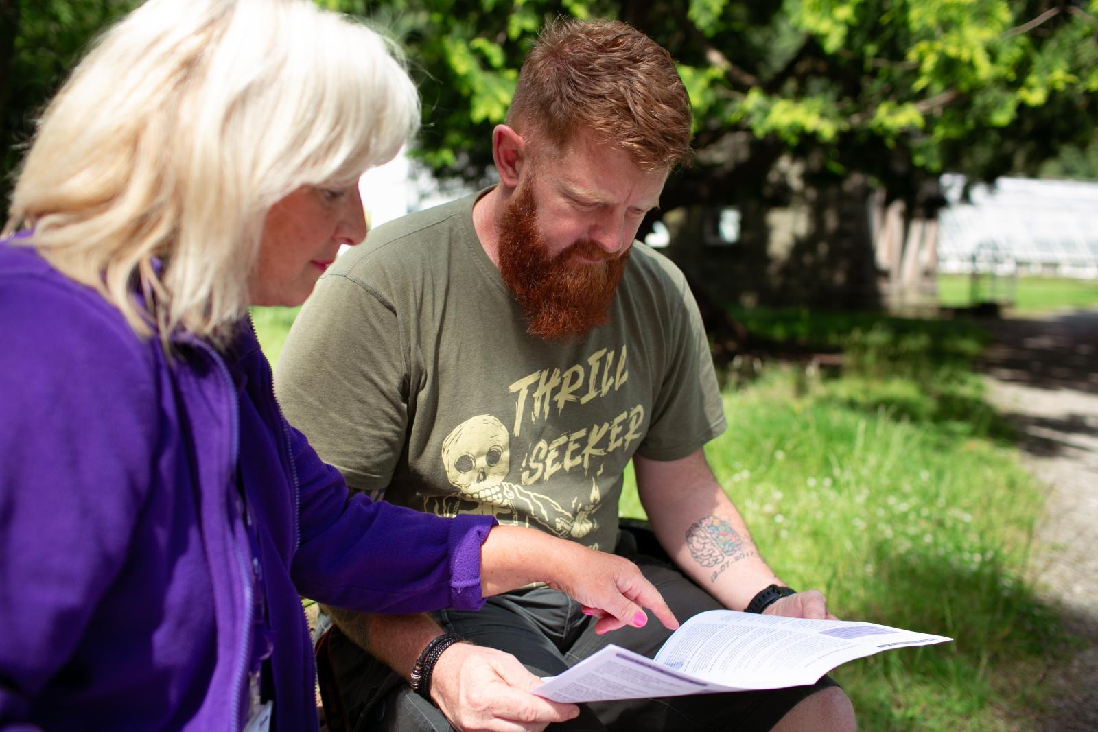 Stroke survivor David Jones with Stroke Coordinator Carla Williams in a park