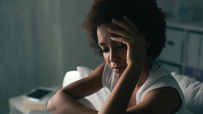 Stock image of a lady looking tired