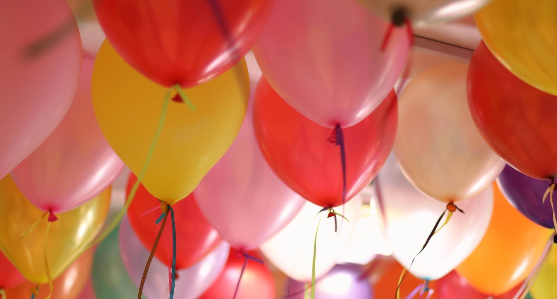 Multi-coloured celebration balloons 