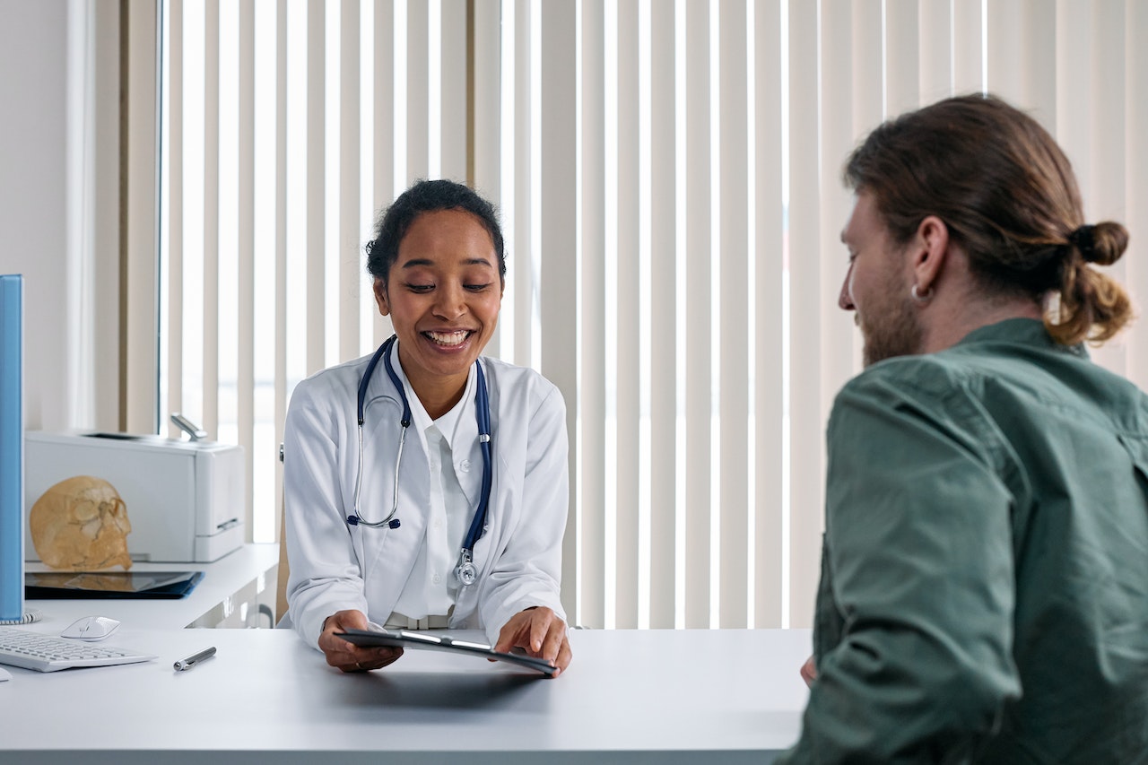 doctor smiling at patient 