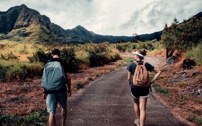 Two people walking in the countryside