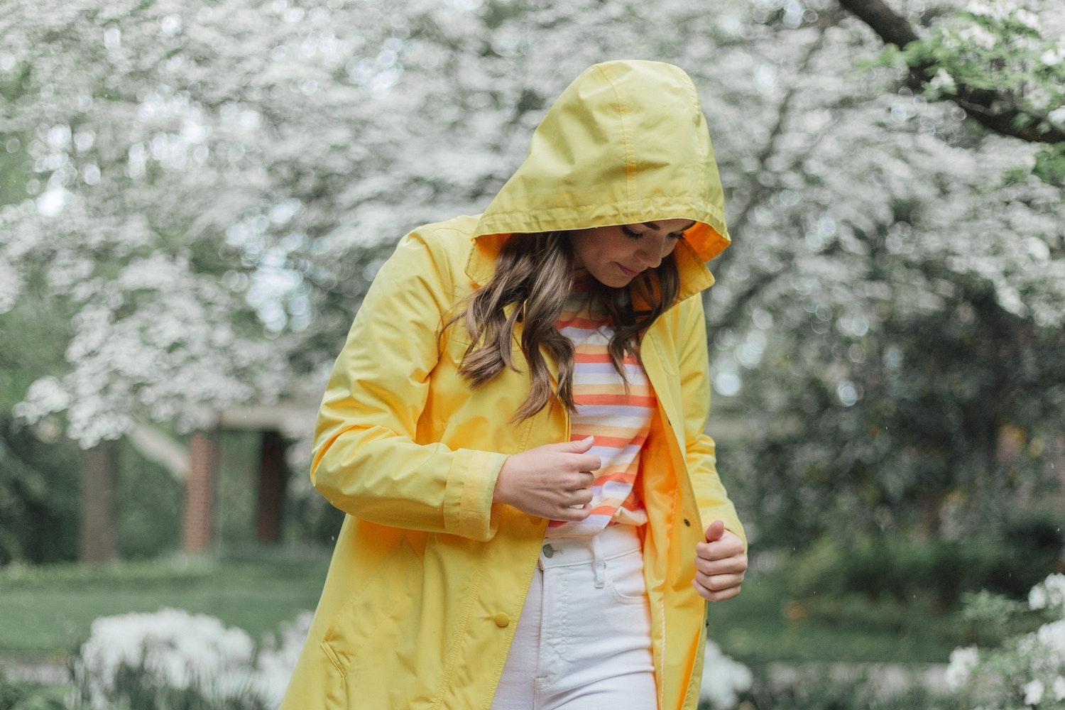 Woman in yellow raincoat