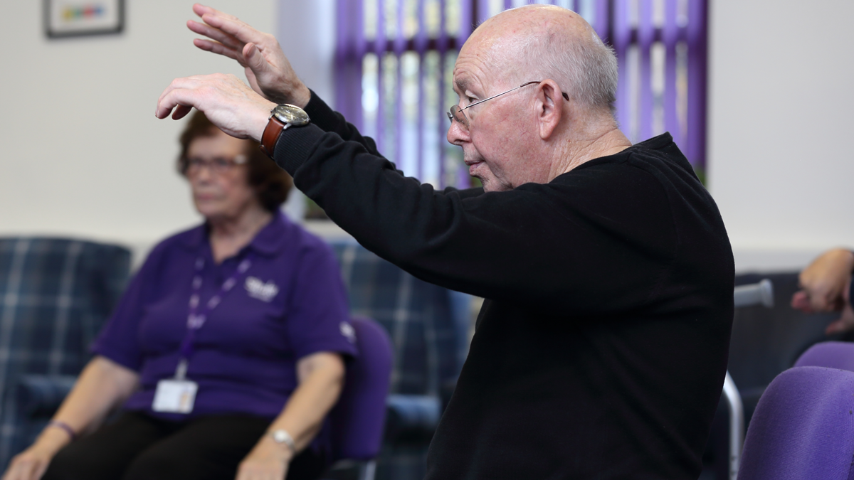 LASC Stroke Group 2021 showing man lifting his arms