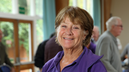 Photo of a Stroke Association volunteer smiling to camera